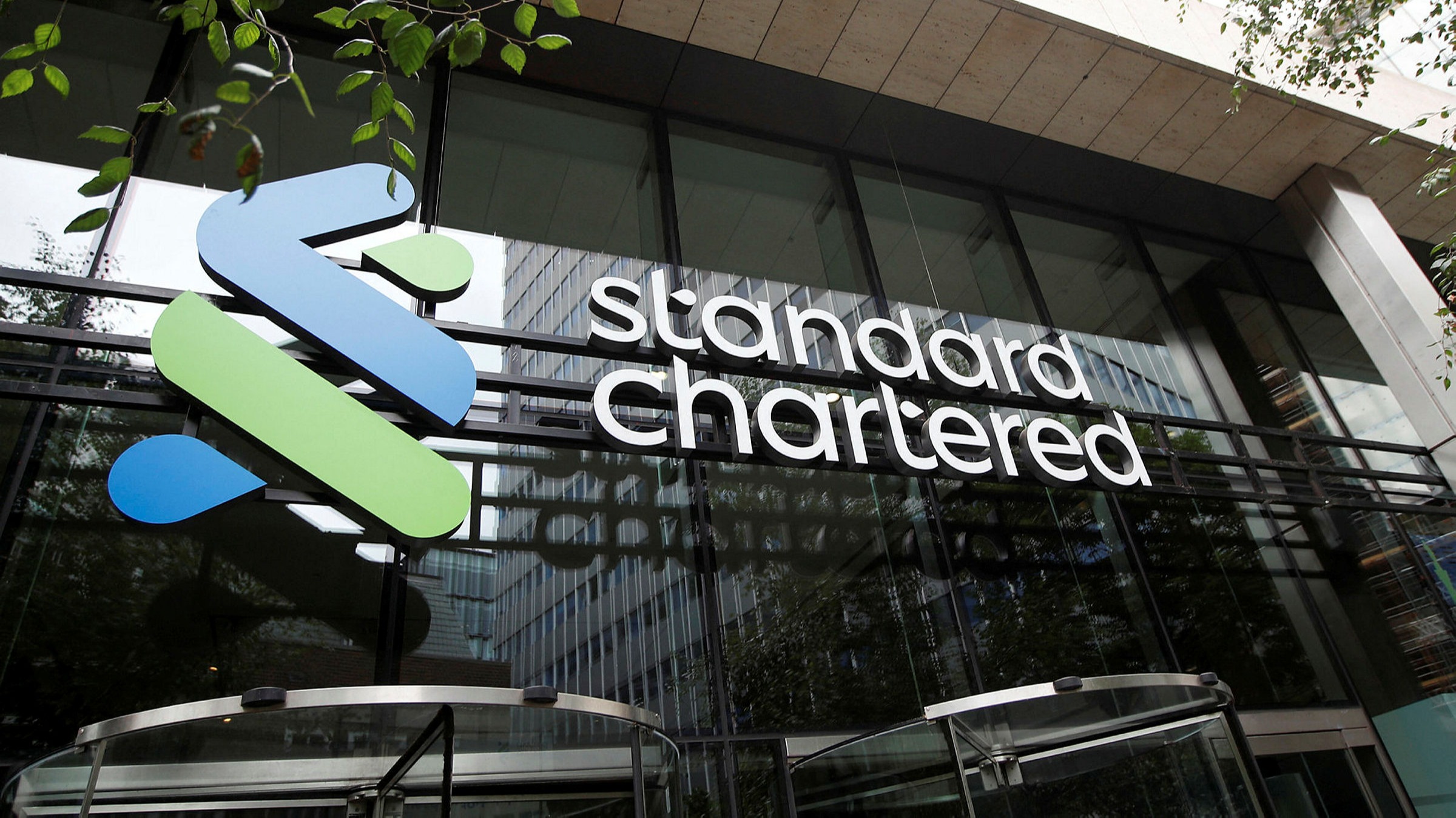 EGINDO StanChart Kurangi Karyawan Di Singapura, Hong Kong, London