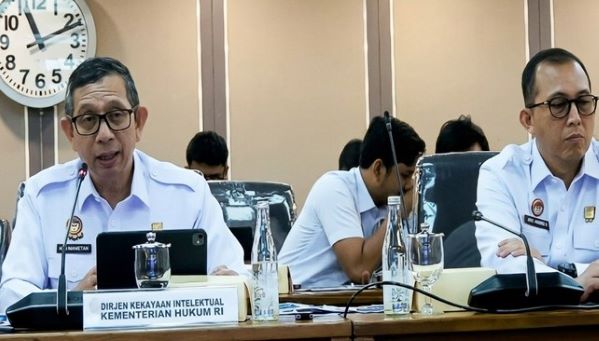 Direktur Jenderal Kekayaan Intelektual Kementerian Hukum, Hermansyah Siregar (kiri) saat RDP dengan Komisi XIII DPR RI. (Foto: Tangkapan layar youtube)