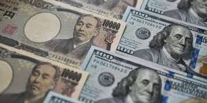 Ilustrasi mata uang Yen dan Dolar