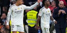 Kylian Mbappe dengan Vinicius Jr