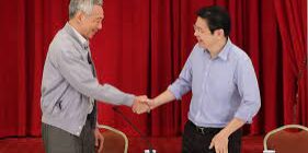PM Lee Hsien Loong bersama DPM Lawrence Wong