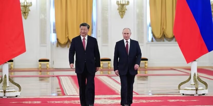 Presiden Xi Jinping bersama Presiden Vladimir Putin