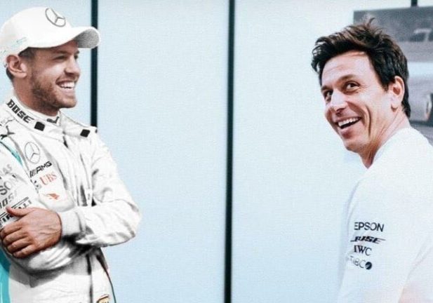 Sebastian Vettel dengan Toto Wolff