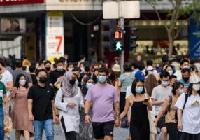 Singapura menganjurkan penggunaan masker
