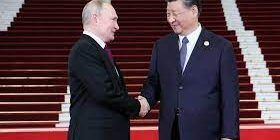 Vladimir Putin bersama Xi Jinping