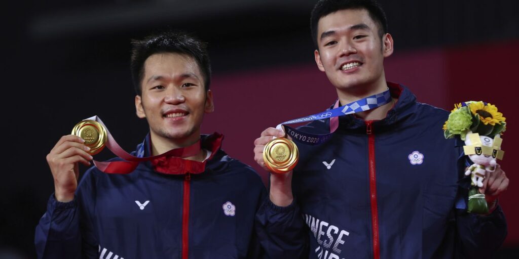 Wang Chi-Lin / Lee Yang - Taiwan, meraih emas ganda putra