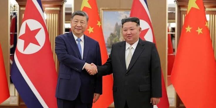 Xi Jinping bersama Kim Jong Un
